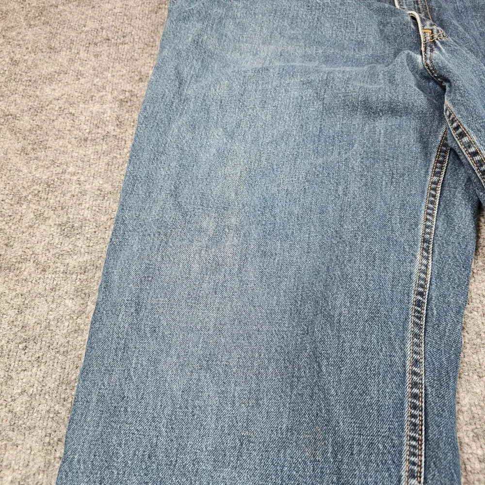 Vintage 1999 Levis 550 Relaxed Fit Jeans Mens 42x32 Medium Wash Distressed Denim